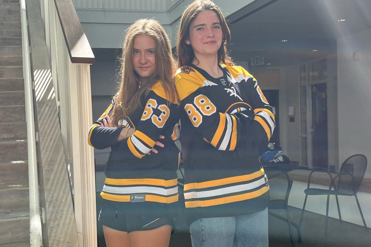 Sabrina Walker (24) and Megan Kelley (24) pose wearing their Bruins jerseys, as they are both fans of the hockey team. Kelley started a fantasy hockey team with her friends, including Walker. I love hockey so much. My moms from Boston, so shes been a fan her whole life. Ive grown up on Boston sports teams, and hockey is one of the biggest sports there, Kelley said. I love hockey — especially in LA, not many people play it or watch it.