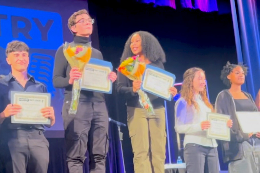 Selah Johnson receives her award for second place in Los Angeles Countys annual Poetry Out Loud competition. Johnson performed American Smooth by Rita Dove and Black Matter by Keith S. Wilson. Photo provided by Selah Johnson. 