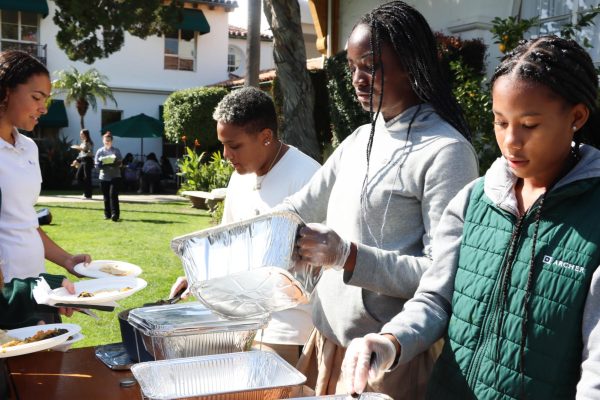 Members of Archers Black Student Union serve samples of dishes from parts of the African diaspora. BSU hosted Taste of Soul Feb. 15 in the courtyard to celebrate Black History Month.