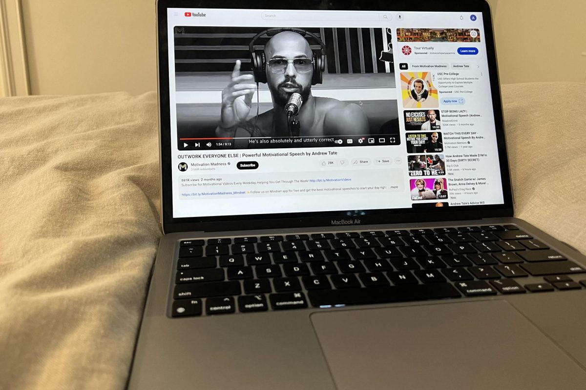 This image features a video of Andrew Tate’s entitled, “Outwork Everyone Else.” This photo represents how one might be sucked into his content, believing it to be empowering and motivational rather than the hateful rhetoric it truly is. It also illustrates how Tate markets his videos in an unassuming manner to draw in and indoctrinate new viewers.