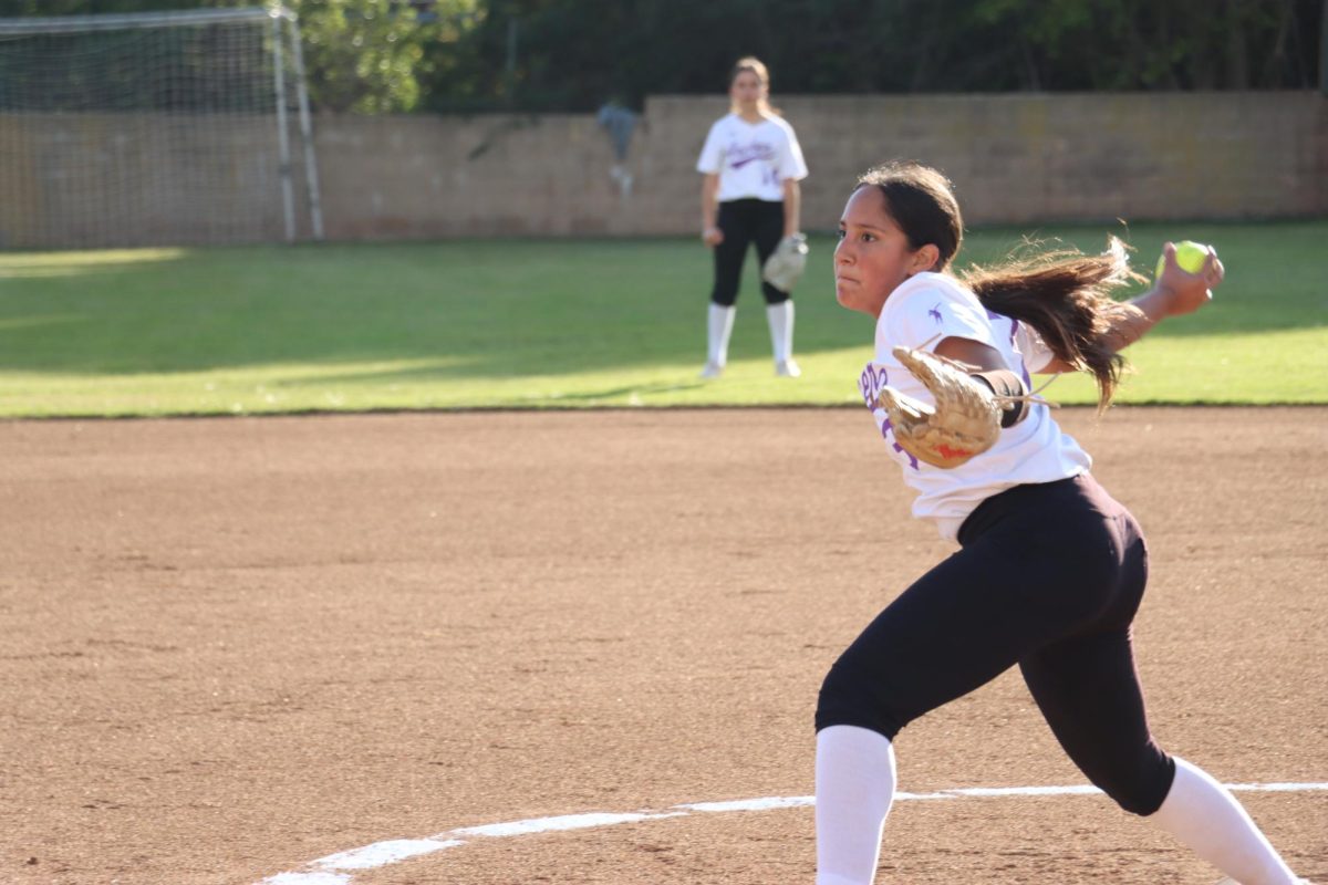 Eighth+grader+Andrea+Fuentes+pitches+for+the+Archer+middle+school+softball+team+at+a+home+game+against+Brentwood+School.+Fuentes+began+playing+softball+when+she+was+4+and+has+pitched+for+the+Archer+team+for+the+past+three+years.