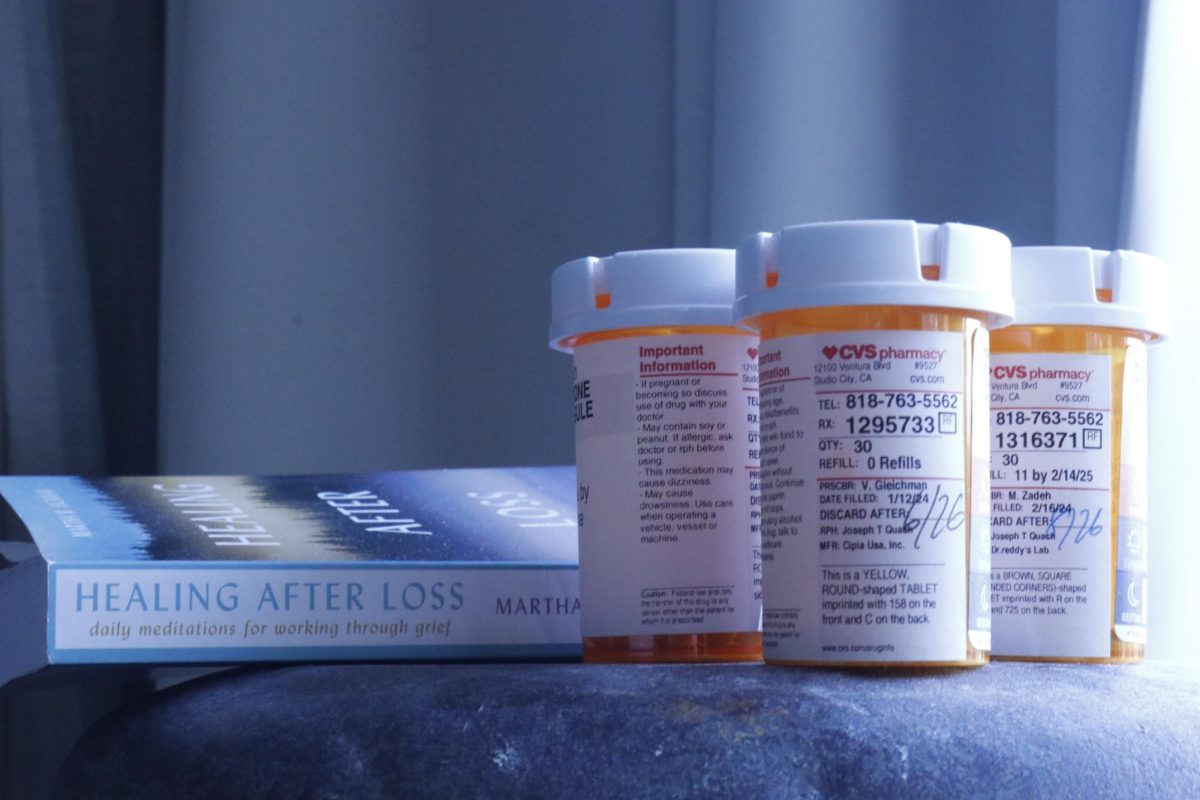 Medication and a book titled Healing After Loss sit on a table. Socioeconomic status plays a role in the quality of care that dementia patients receive. According to the Alzheimers Association, Individuals who experience high socioeconomic deprivation ... are significantly more likely to develop dementia compared to individuals of better socioeconomic status, even at high genetic risk.