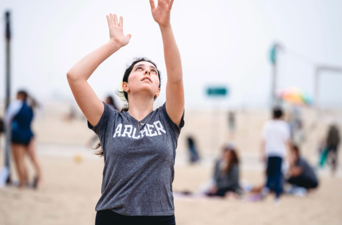 2024 graduate Micaela Boxer Wachler serves at a beach volleyball match. Boxer Wachler has been playing indoor volleyball since fifth grade, but started playing beach volleyball this past year. Photo courtesy of Archer Athletics.