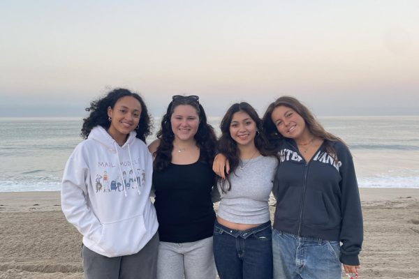 Seniors Eden Sinclair, Charlie Clayton, Phoebe Ramirez and Alina Williams smile for a picture at the beach. Senior Sunrise took place this past Saturday at Will Rogers Beach from 6-7:30 a.m. 