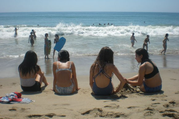 Students talk, make sand castles and swim in the ocean during Fall Outing. The Class of 2027 went to Will Rogers State Beach for Fall Outing on Friday, Sept. 6.