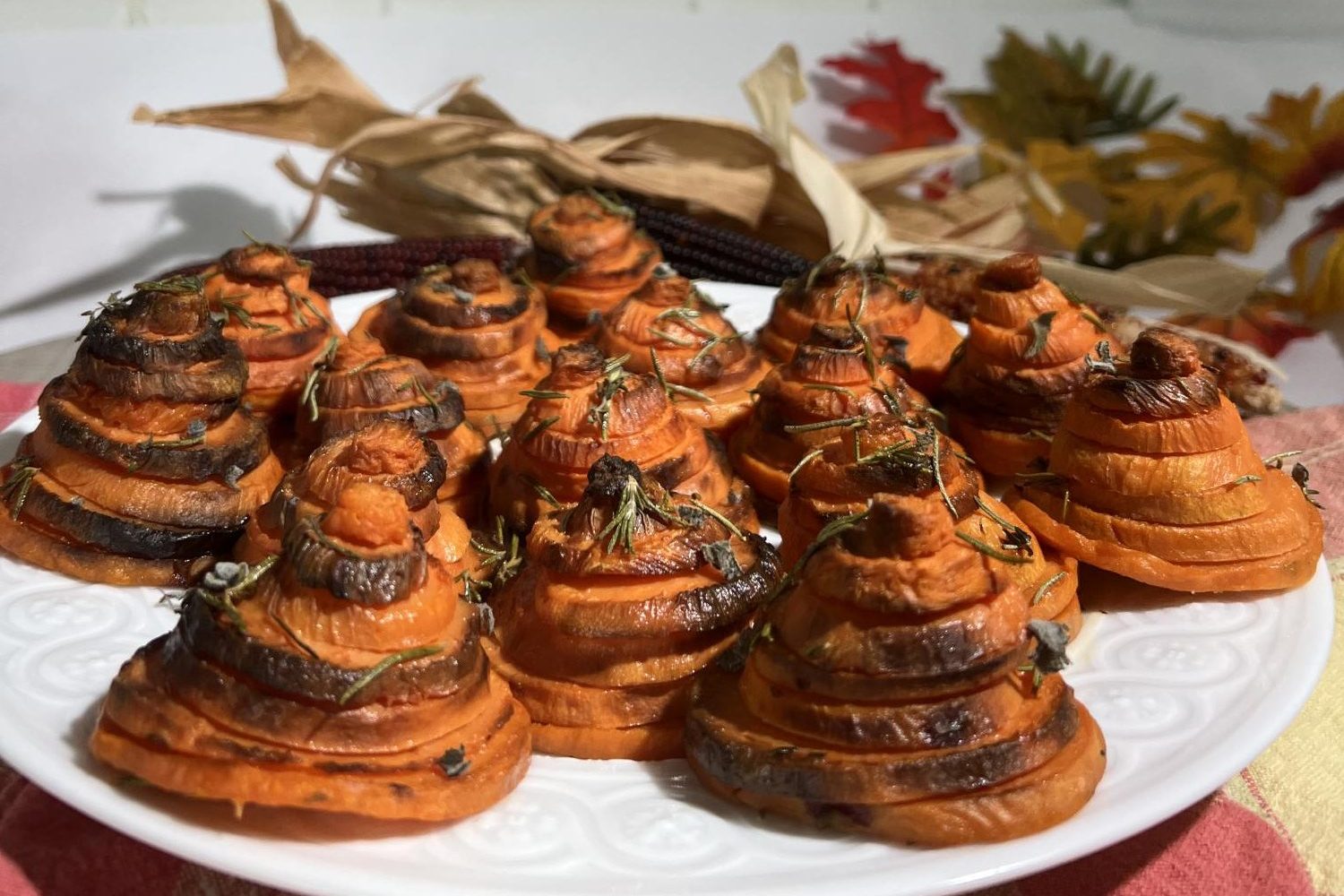 These buttery, rosemary sweet potato "Christmas trees" are a Thanksgiving staple in our family. Once an experimental recipe failed by my middle school self, we've come to innovate new ways to cook it, proving that trying new recipes can result in your next favorite dishes.