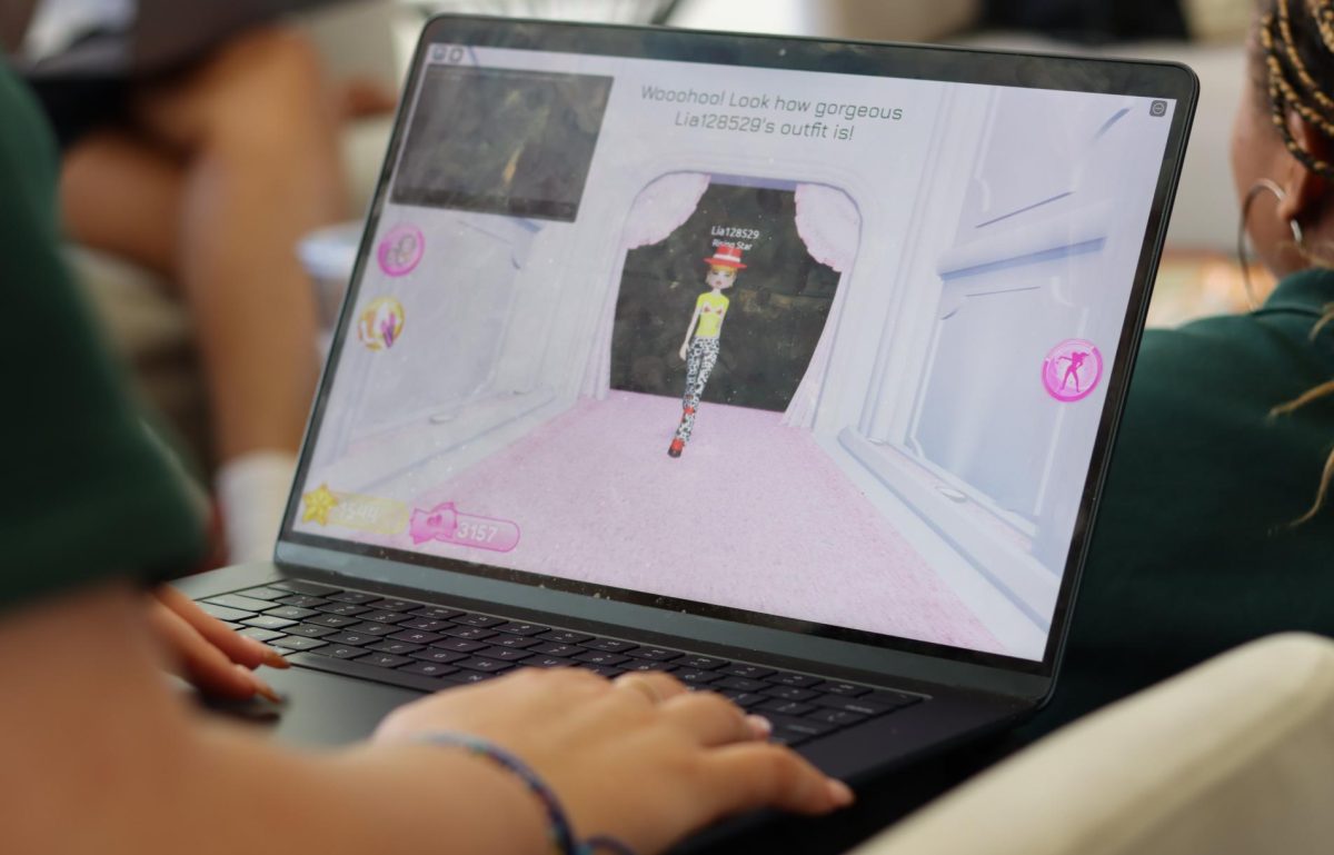 Junior Tessa Moshtaghi plays Dress to Impress on Roblox during her free period. Roblox is an online gaming platform where players can virtually play games created by themselves and other players. Dress to Impress is a competitive fashion game where players participate in a virtual fashion show.