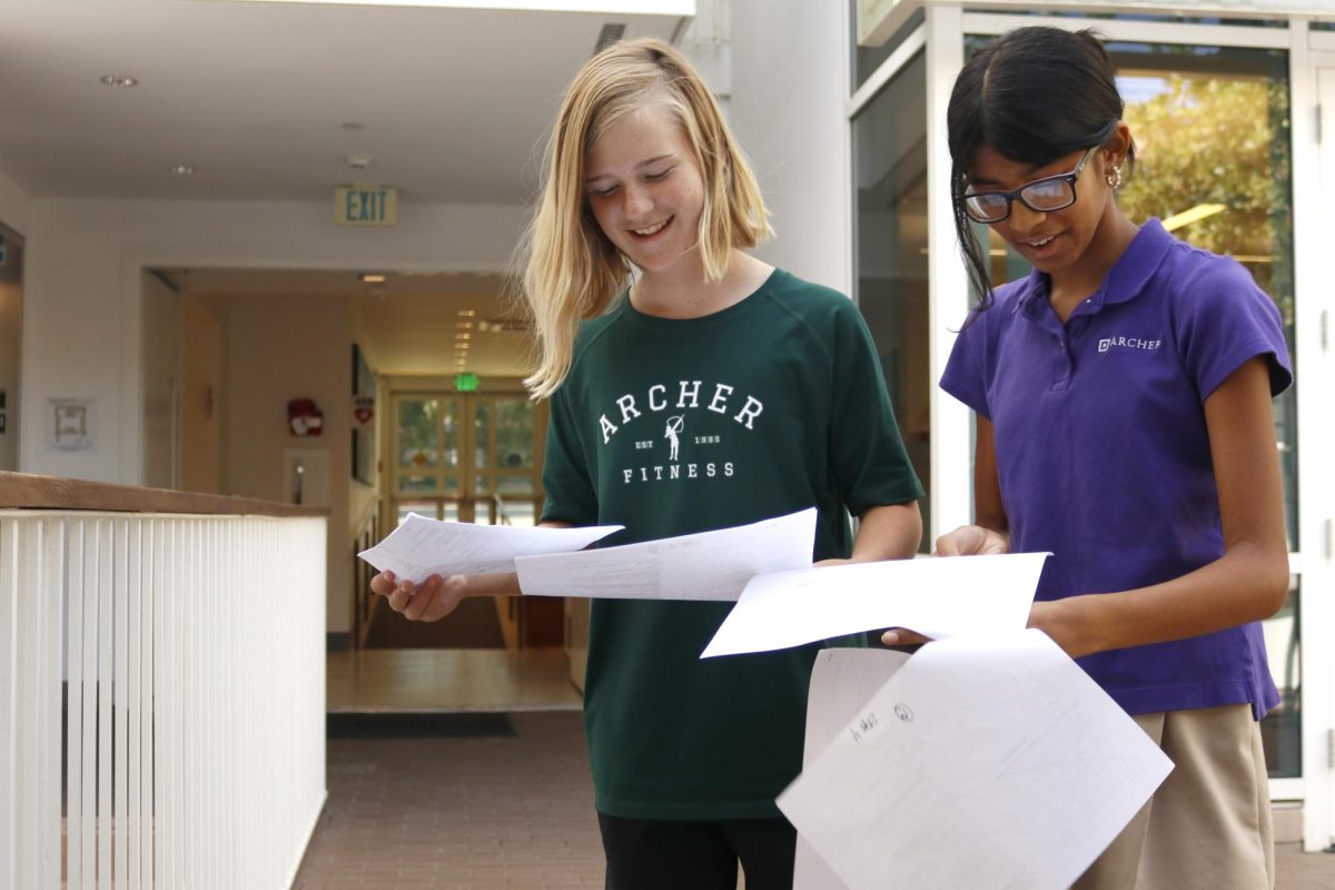 Seventh graders Anika Jain and Lily Bishton Kraus rehearse a "Hetty Feather" scene ahead of auditions Sept. 12. "I saw people rehearsing their monologues in the RBG courtyard, and they all sounded amazing," Jain said. "I'm really excited to get to do the show with them. "