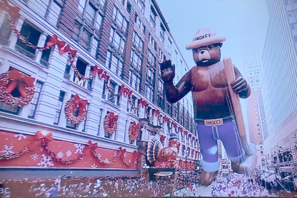 The Macy’s Day Parade plays on the TV right as the Smokey the Bear float goes by. The 3 hour parade starts at 8:30 a.m. in all time zones. 