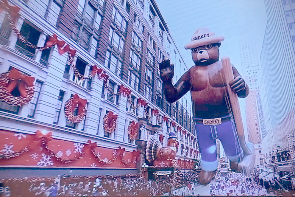 The Macy’s Day Parade plays on the TV right as the Smokey the Bear float goes by. The 3 hour parade starts at 8:30 a.m. in all time zones. 