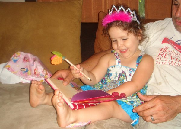 Three-year-old Lucy discovers her love for writing as she opens her first journal. As we grow up, our school deadlines, work schedules and social media habits absorb all of our time and passion for the hobbies that used to define our identity. (Photo credit: Nicole Williams)