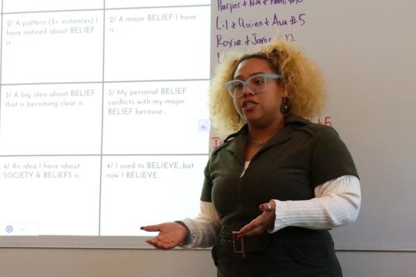 Focused on the lesson ahead, Sala Bandele teaches her seventh graders about personal connections and the difference between personal and major beliefs. "I try to bring charisma to the classroom," Bandele said. "Some days we're all just going through stuff, and the classroom can sometimes just be that escape."