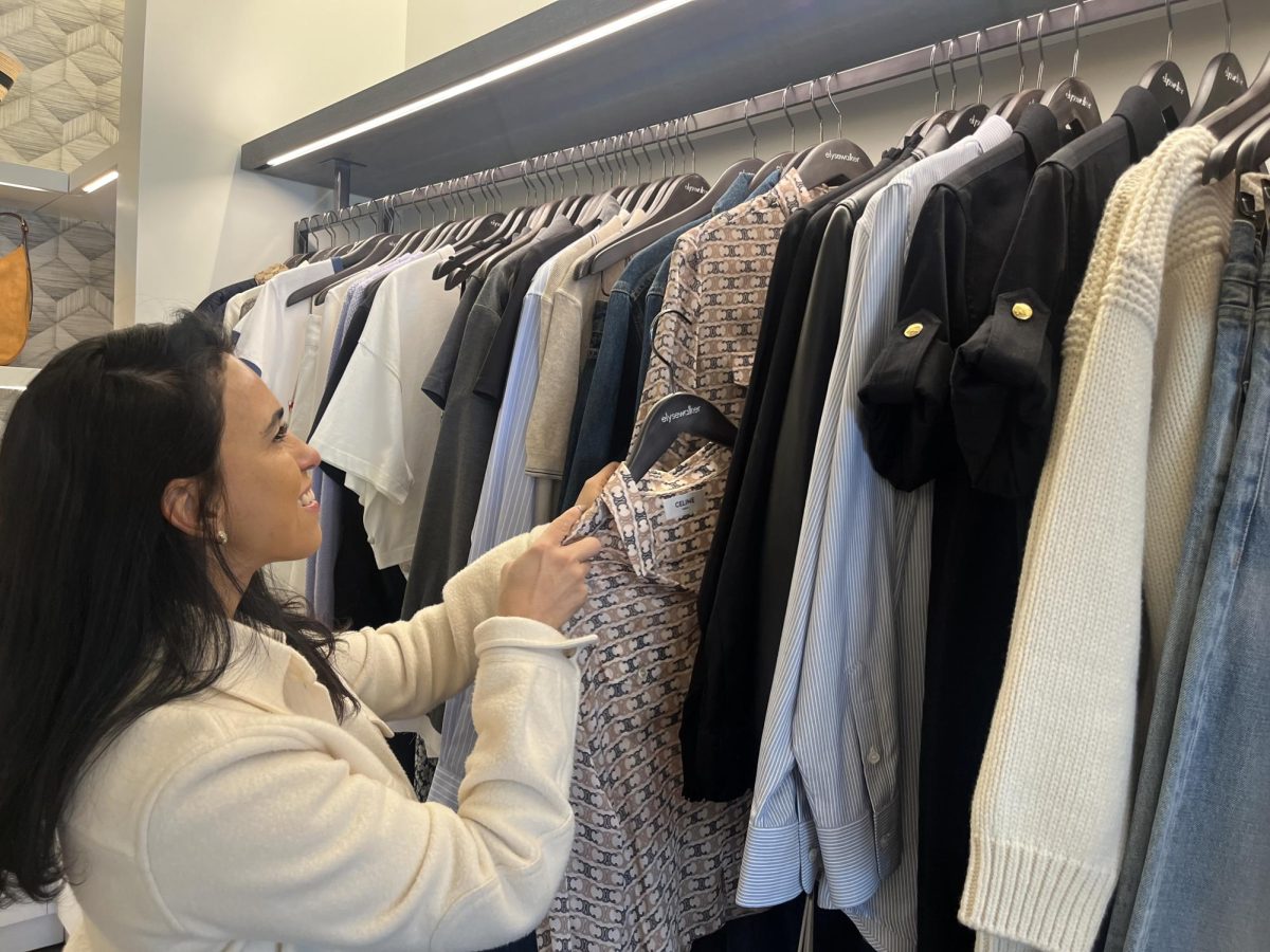 Stylist Flor Hernandez stocks clothing at Elyse Walker's Calabasas Commons Location. Elyse Walker was founded in 1999, and currently has 3 locations around the Los Angeles area. They lost 2 locations due to the Palisades fire, but are hoping to rebuild. 