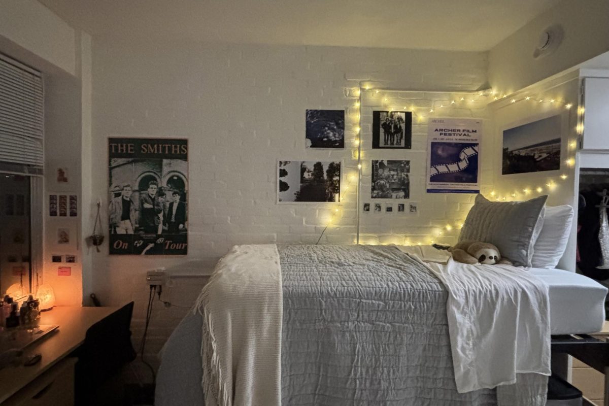 Fairy lights glow in Maya Acutt and Alicia Flores's dorm room at Tulane University with an Archer Film Festival poster hanging on the wall. The roommates begins their first year of college after graduating Archer in the class of 2025.