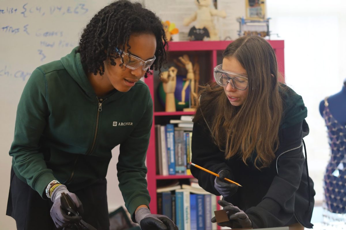 Claire Desrosiers (’28) and Charlotte Bloomfield (’28), members of Archer’s Invention Team, measure metal lining for the team’s fire-proof planter prototypes. The planters were used in a chemical experiment exploring plant-safe alternatives to standard fire retardants. The students created their own solution in the lab and tested it under controlled fire conditions. The prototypes helped the team observe how their formula reacted when applied to soil treated with traditional fire retardant.
(Photo credit courtesy of: Belén Haro)