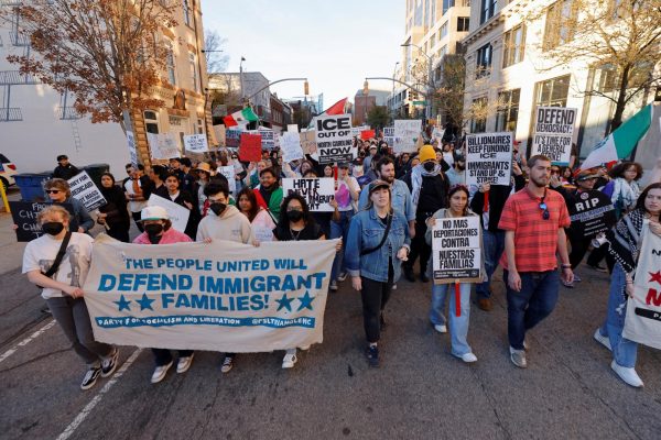 People protest as federal authorities conduct raids in Charlotte, expanding their crackdown on illegal immigration, in Raleigh, North Carolina, U.S. November 16, 2025.  REUTERS/Jonathan Drake