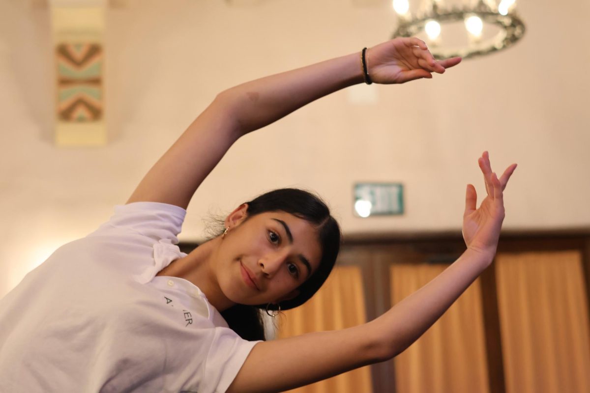  Eighth grader Simone Alba rehearses her contemporary dance in the rose room. As a dancer, Alba loves practicing the art of dance as much as she can in all different ways. “I think dance is one of the most important things in my life,” Alba said, “just because it helps you so much with everything.”