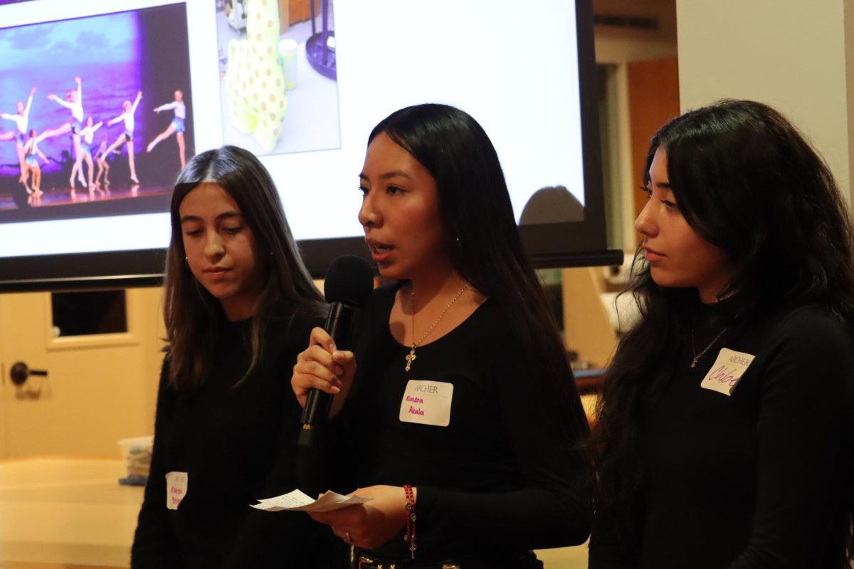 Presenting in Spanish, Alondra Alcala Garcia ('27) discusses about her experience in Archer's ceramics department and displays some of her work on screen. In addition to highlighting dance, sports, academics and college preparation, Hermanas Unidas hosted Spanish-Speaking Families Night Dec. 4, to share information and foster a sense of belonging among Spanish-speaking families in the Archer community.