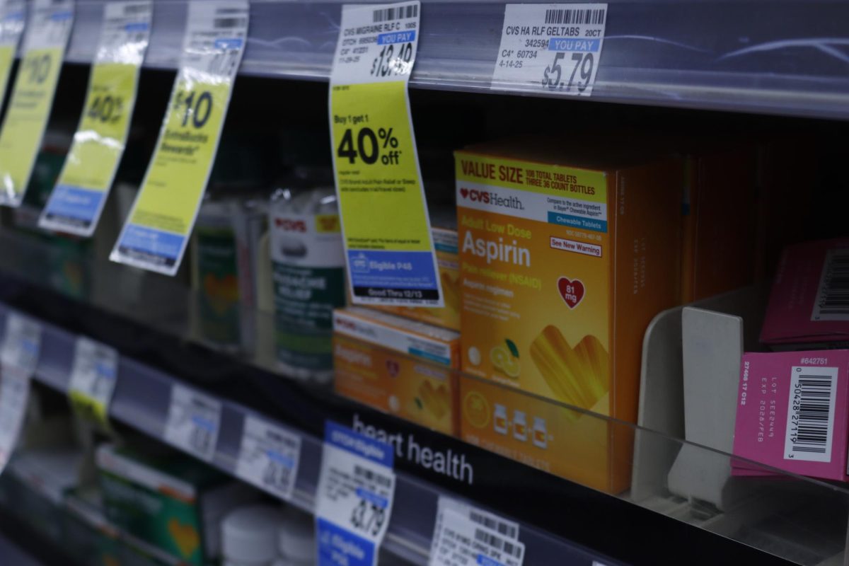 A box of aspirin sits on a shelf at CVS Pharmacy alongside other medications. According to the New York Presbyterian, aspirin is one example of a drug that was wrongfully prescribed to women due to the lack of research on the drug’s effect on women’s bodies.