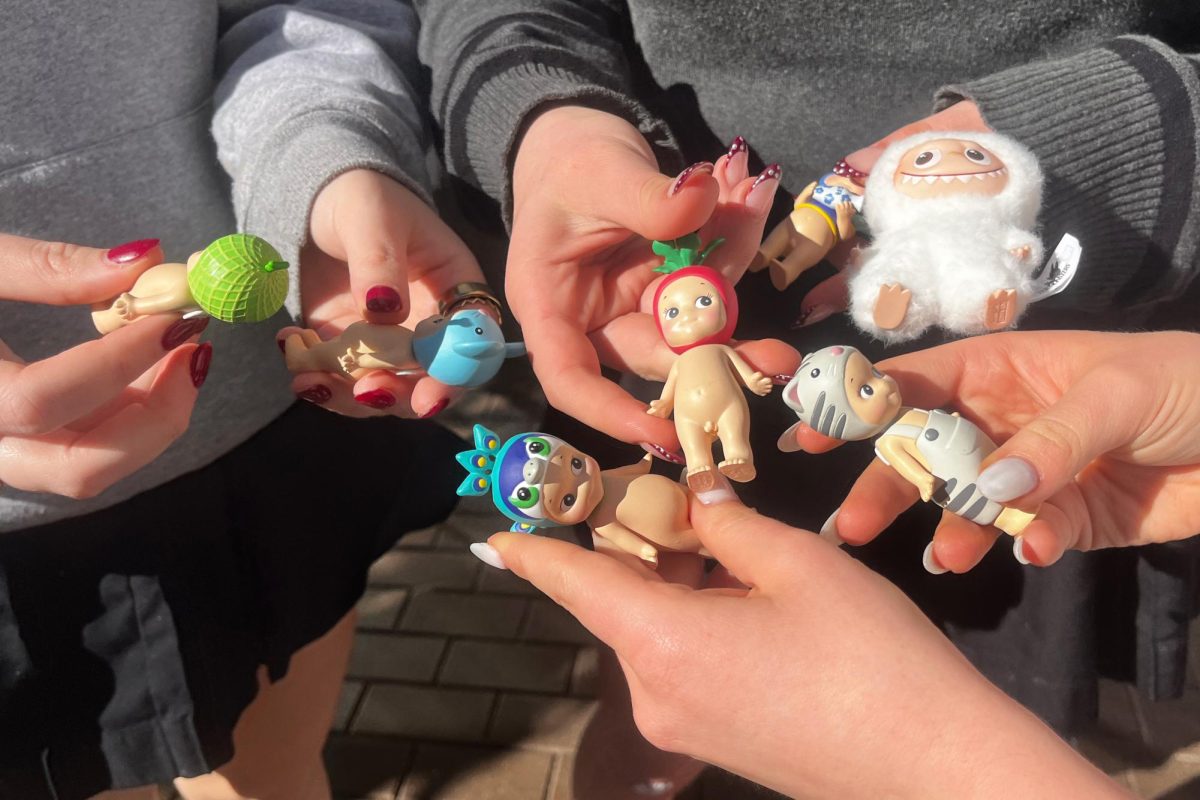 Students hold an arrangement of Sonny Angel figures and a mini Labubu — blind box collectibles that have become popularized by Gen Z on social media. Despite their innocent appearances, blind box companies use a variable reward system, creating an addictive chemical neurological reaction in consumers — a reaction similar to ones caused by forms of gambling. Clinical Director of West Side Gambling, Dan Field, said new and accessible chance-based activities are drawing in younger audiences. “I even have clients that are under 18 that are playing a lot of video games and are getting involved in loot boxes, and have access to cryptocurrency to buy in game purchases,” Field said.