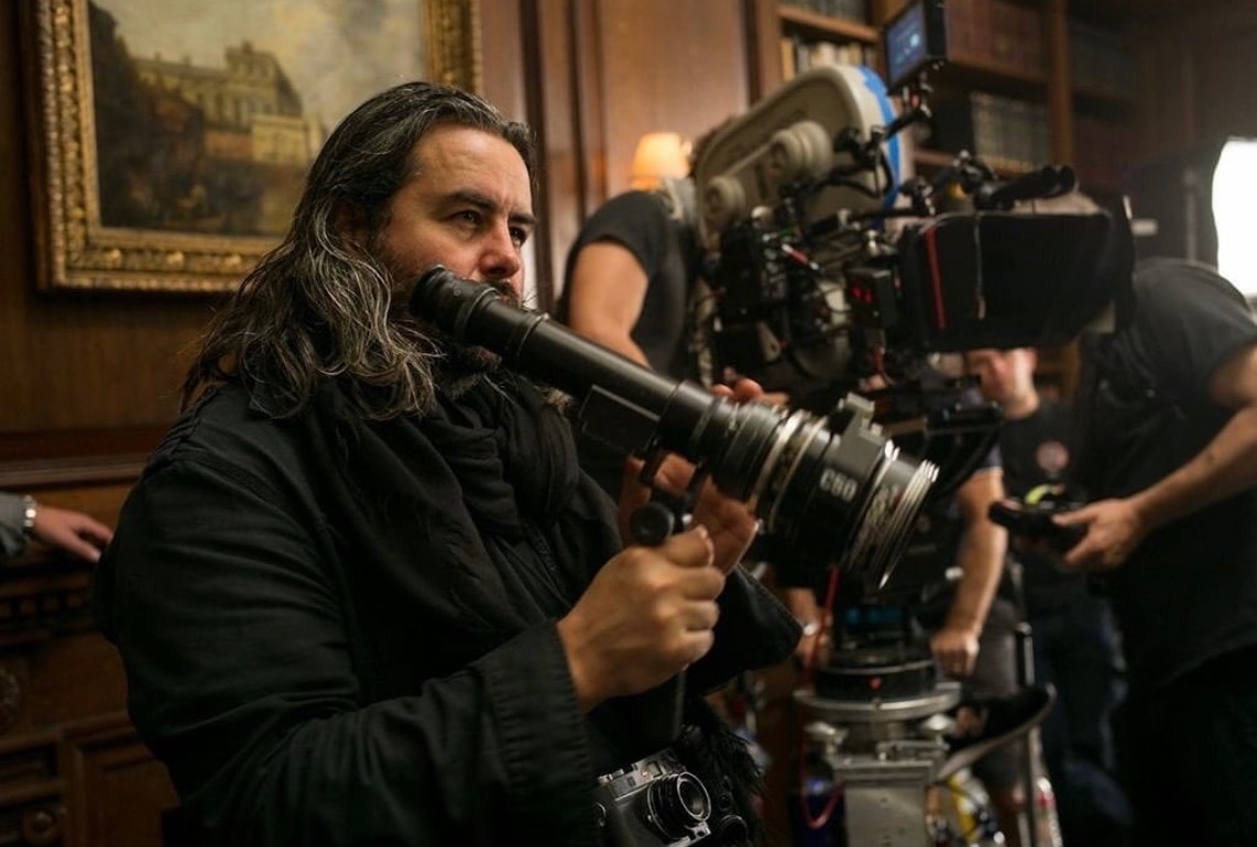 Cinematographer Hoyte Van Hoytema stands, controlling a camera. Hoytema said growing up in Holland, there was less of a forum for those who wanted to go into the film industry, and it was difficult to begin to pursue a career in cinematography. "In order to do it,  I had to broaden my horizon a little bit, and there was a lot to learn," Hoytema said. "It took quite some time, but I am very happy I stuck to it." (Photo Courtesy of Bonnie van Hoytema ['28])