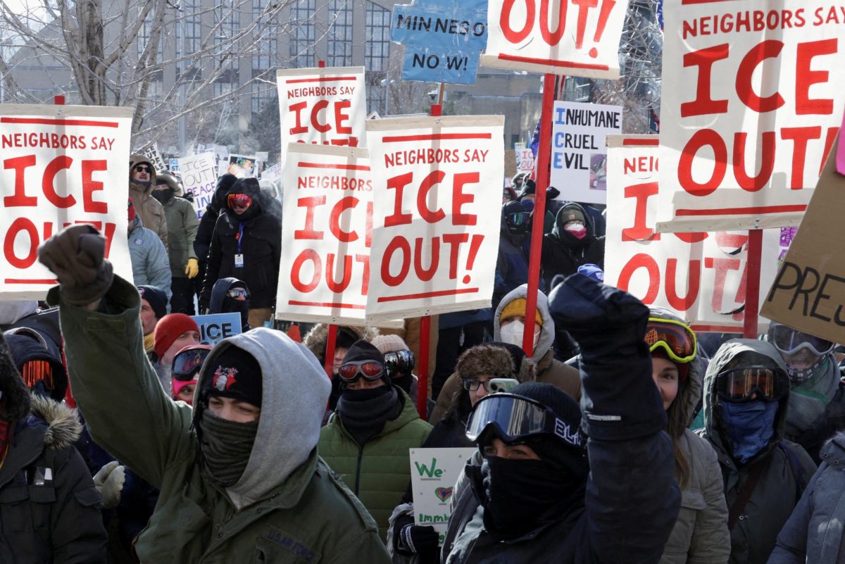 Demonstrators carry placards on the day of a general strike to protest U.S. President Donald Trump's deployment of thousands of immigration enforcement officers on the streets of Minneapolis, Minnesota, U.S., January 23, 2026.  REUTERS/Evelyn Hockstein