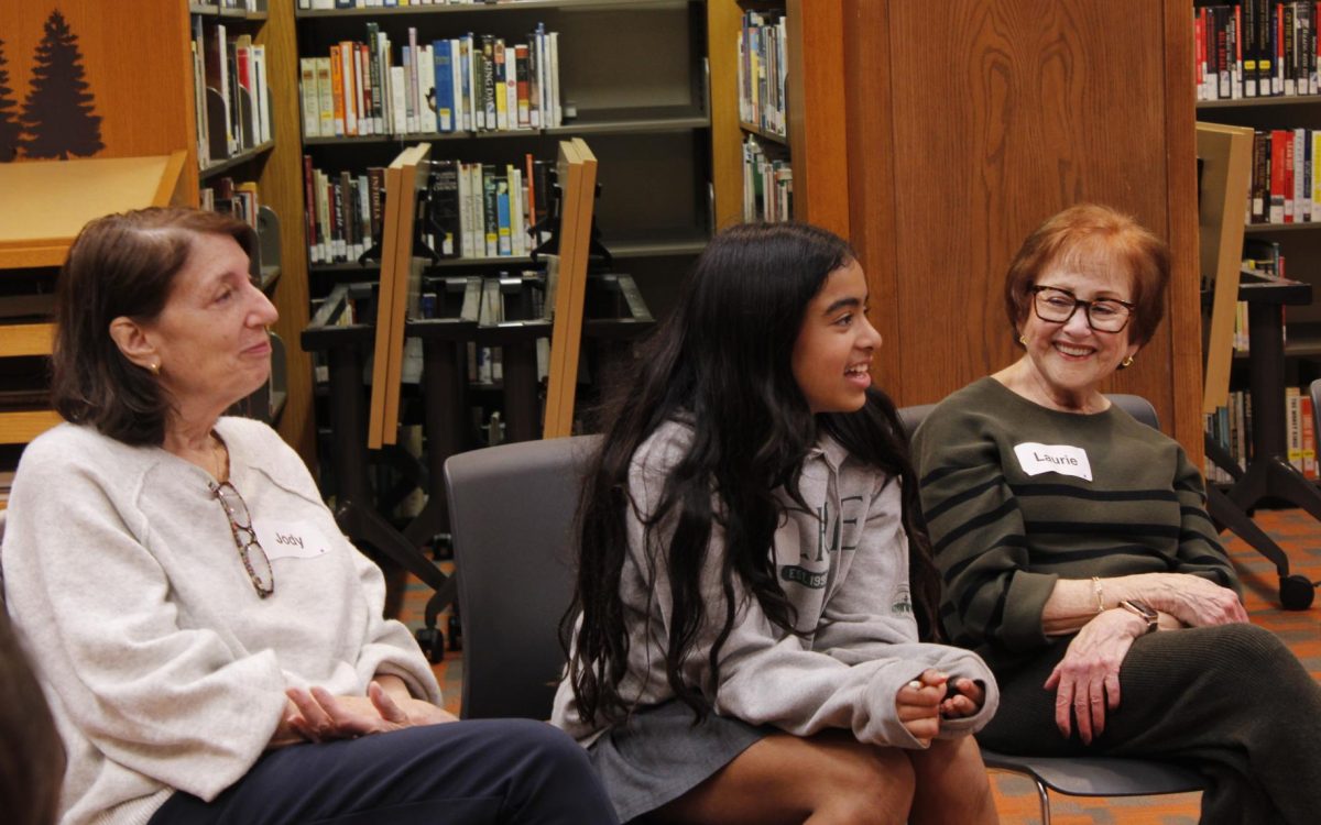 Anika Dave ('32) laughs alongside Jody Hubert and Laurie Rauss. Archer worked with Sages & Seekers for Sixth Grade Service Day, giving middle schoolers a chance to build intergenerational relationships through conversation. The prompt for the sixth graders and older adults was “What was your scariest life experience," but some stories shared made people laugh. “I think the experience of having a discussion where both people are really listening is important,” History Department Chair Elana Goldbaum said. “just expanding their lens of life experience from older people, but also being taken seriously by an older person is really important.”