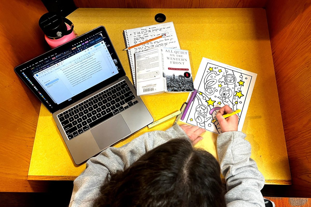 A student takes a break from preparing for an English project to color. As the second semester continues, finding time for hobbies and personal interests can not only give students a break from academics, but also relax and allow them a chance to decompress in a creative manner.
