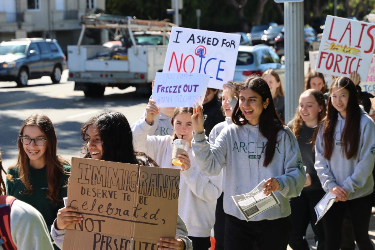 Students yell out chants while holding posters throughout the crowd. Ava Binder ('27) expressed the importance of continuing to have walkouts and other ways of protesting. “The more walkouts and protests we do, the more we can spread our voices,” Binder said. “We're not going to back down and settle for what is going on.”