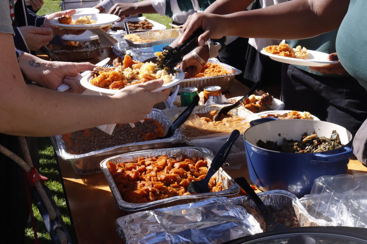 A display table in the courtyard showcases homemade dishes brought in by members of the Black Student Union for the annual Taste of Soul Feb. 3. BSU Executive board member Alexa Grant ('26) said the event encouraged people to explore new foods and engage more deeply with Black history and culture. "I heard a lot of people got to try things that they never had before," Grant said, "so I think it's just a great way to expand people's minds as well as their taste palettes."