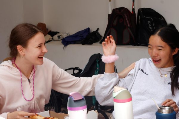 During lunch, Serena Ho (’29) and Maya Kurc (’29) laugh with each other. Happiness is an emotion that takes many forms, with social interaction having a significant impact on it, according to The Harvard Study of Adult Development. The Oracle surveyed the Archer community, and 45% of respondents said their moods are impacted by social interaction. 