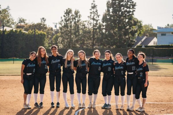 The Archer varisty softball team poses for a photo after their second-to-last game against Cantwell-Sacred Heart of Mary High School. Luna Huber-Verjan ('28) said she found the game against Cantwell-Sacred Heart just as difficult as the game against Windward. "It was hard playing against such difficult opponents and then losing to Windward," Huber-Verjan said, "but we were so close and played our best both times. (Photo courtesy of Archer Athletics)