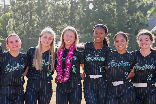 Archer’s varsity softball team poses for a photo on Senior Night when they played their game against Brentwood School. The only senior on the team, Cleo Wilson, said that while the season has come with many challenges, she has been able to remain positive by remembering her purpose. “Remembering it’s supposed to be fun has been my main mindset throughout the season,” Wilson said, “and I’m glad that has been able to show through my energy and positivity.”