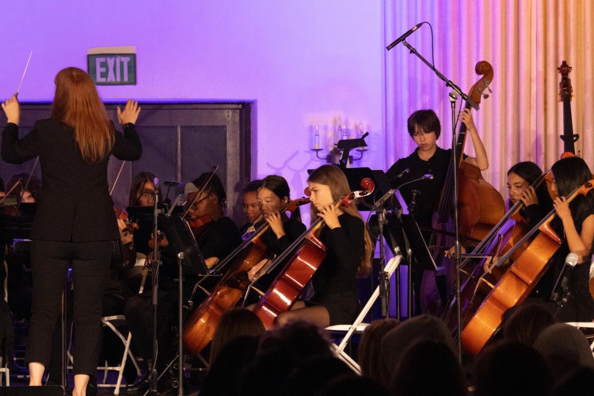 The middle school orchestra, alongside Serena Ho ('29) and Cate Dicus ('29) is conducted by Orchestra Director Hannah Murray. Murray said the concert is not only a place for students to perfect their skills in the arts, but also a place to grow in other ways, too. "They lean on their experience of feeling nervous on stage as a musician," Murray said, "and knowing how to comport themselves with confidence through those nerves."