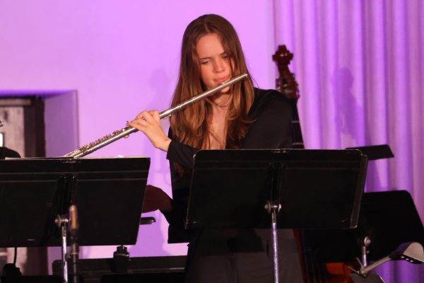 Skylar Roberts ('26) plays the flute during the 2026 spring concert. Roberts has been part of Archer’s orchestra program since sixth grade and took on the role of assistant director this year. "It's been really rewarding to see the program grow," Roberts said. "I'm assistant director and flute section leader, and it's been great to see everything come together."  